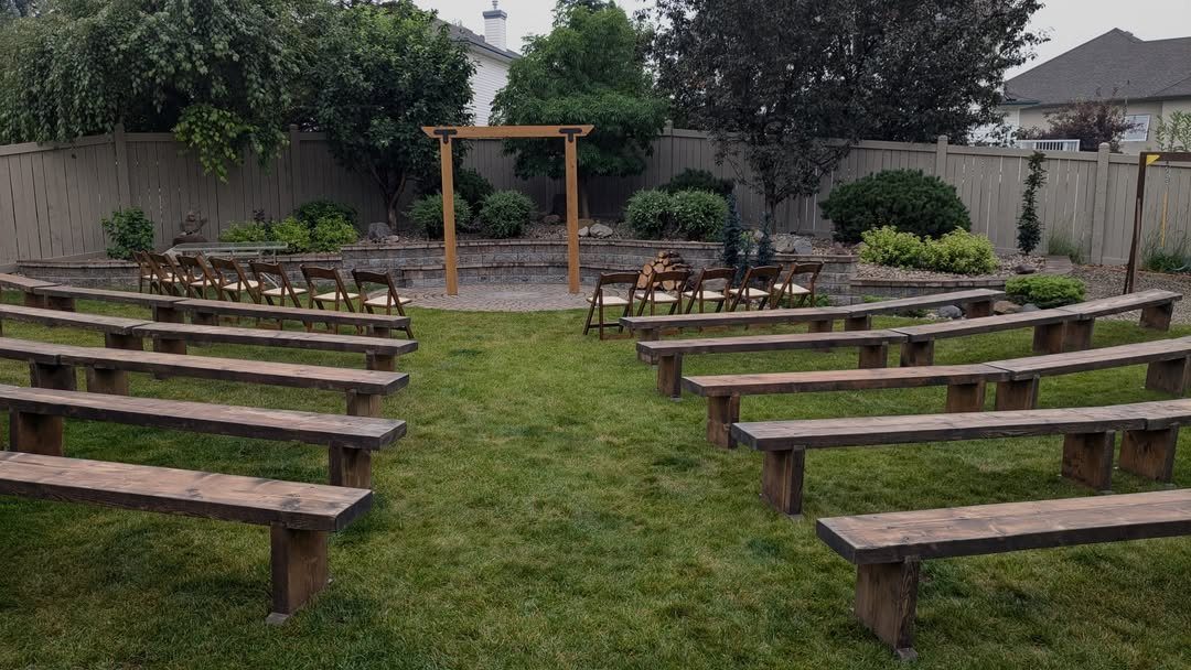 10 Outdoor Wedding Aisle Decor Ideas with Photos 9 Wooden benches arranged in rows on a lawn facing a simple wooden arbor.